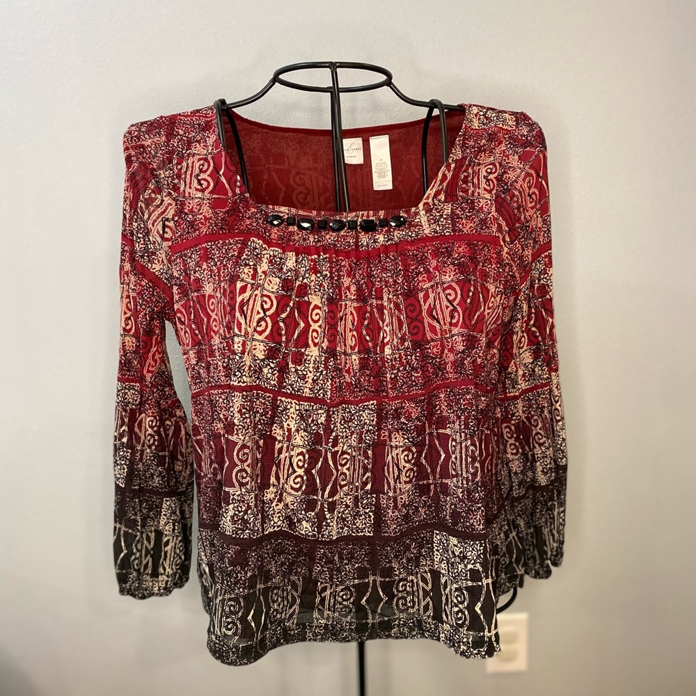 Emma James brand printed long sleeve blouse.